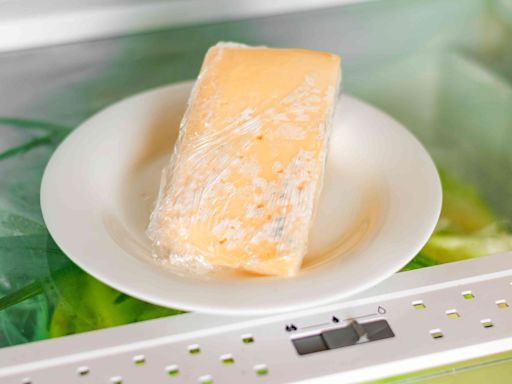 Should You Throw Away Moldy Cheese? Here’s What the Experts Say