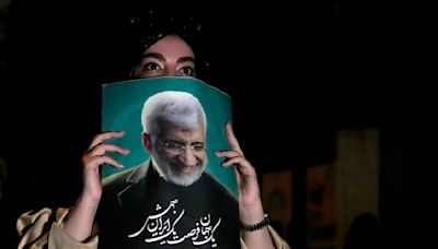 First candidate drops out of Iran presidential election, due to take place Friday amid voter apathy