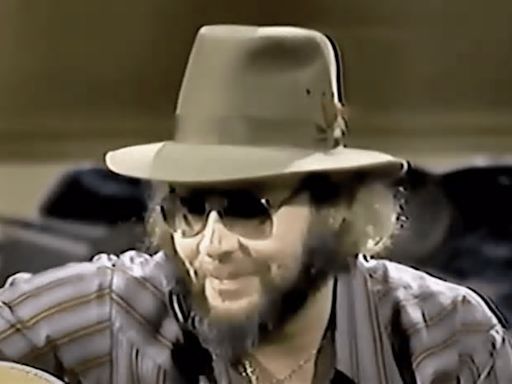 Watch Hank Williams Jr. Play “All My Rowdy Friends (Have Settled Down)” For The Country Music Legends Who Inspired It