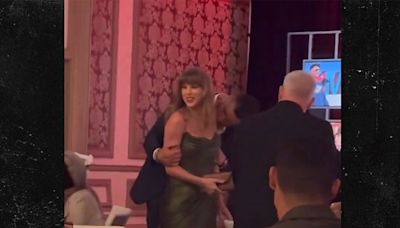 Travis Kelce Covers Taylor Swift's Arm With Kisses At Las Vegas Gala