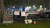 Anti-war protesters leave USC after police arrive, while Northeastern ceremony proceeds calmly