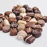 Chocolates are confectionery products made from cocoa beans, typically available in various forms. Chocolates vary in cocoa content, sweetness, and texture, appealing to a wide range of taste preferences.