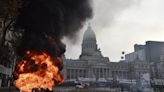 Protesters and police collide after Argentine president’s spending cut passes Senate