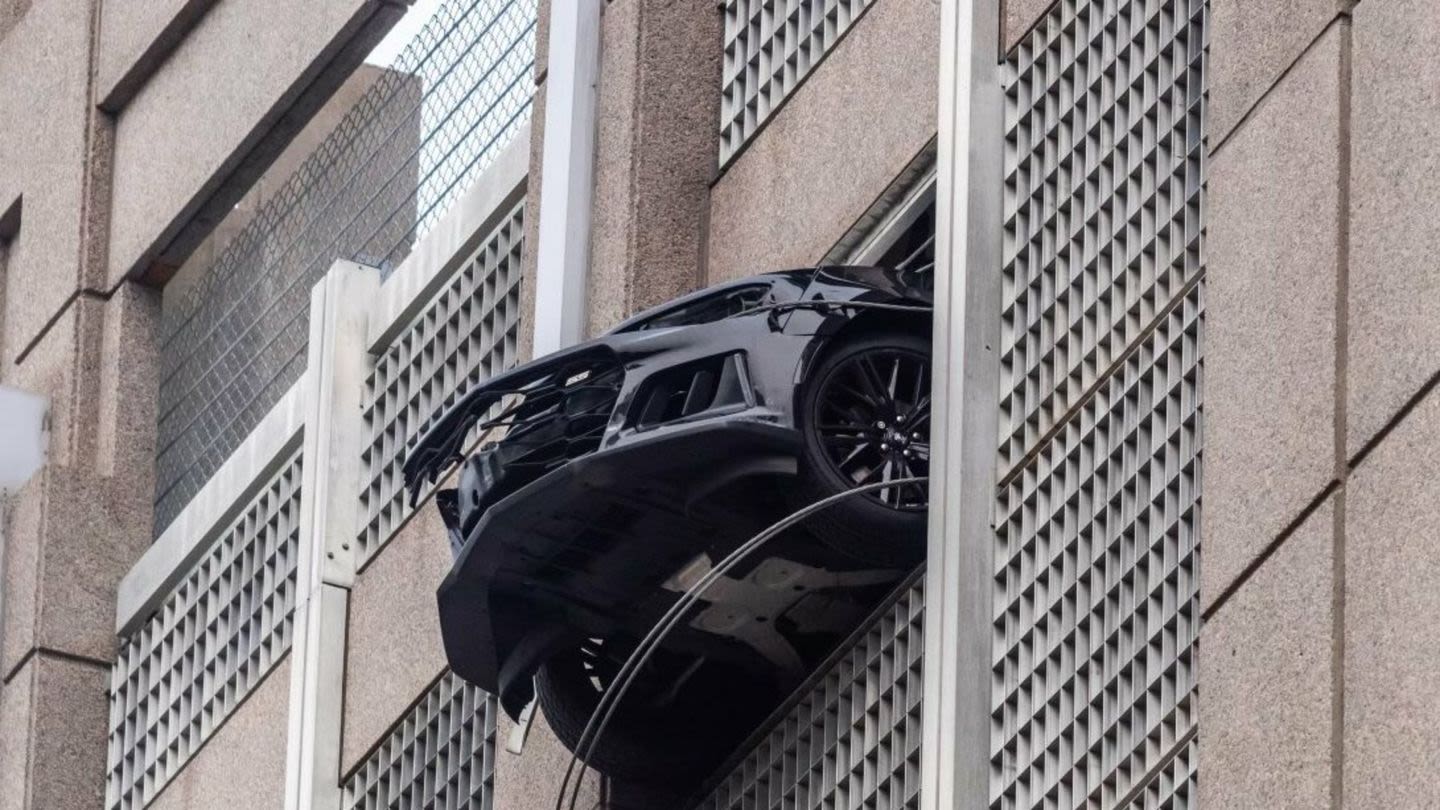 Chevrolet Camaro Left in Neutral Rolls Away, Dangles Off Charlotte Parking Garage