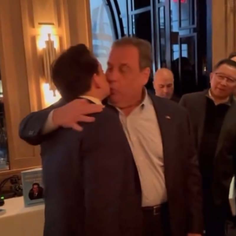 Chris Christie Embraces Former Trump Aide With Mouth Kiss