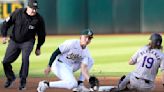 ...sliding in ahead of the throw to Zack Gelof of the Oakland Athletics in the first inning at the Oakland Coliseum on Wednesday, May 22, 2024, in Oakland, California.