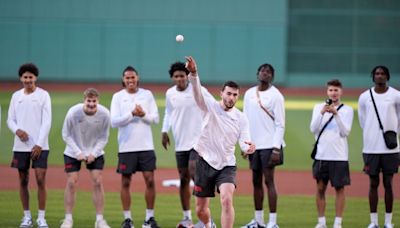 UConn’s Alex Karaban throws a strike before Red Sox host Yankees at Fenway Park