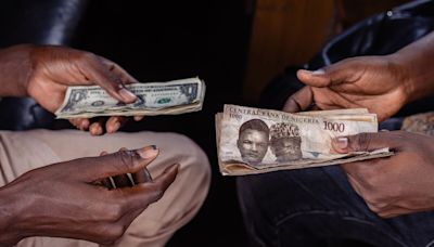 Nigeria Bans Naira Street Trading as Battered Currency Takes Another Hit