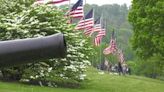 Volunteers place thousands of flags in West Newton Cemetery to honor veterans