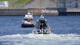 Harbor security drills using blank rounds draw protesters to Navy base in Japan