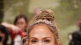 Jennifer Lopez Stuns in a Near-See-Through Schiaparelli Dress and Top Knot