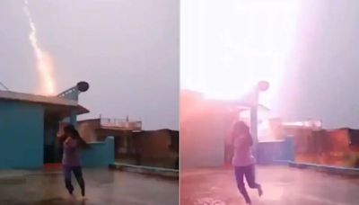 Viral Video: Girl's Rain Dance Interrupted By Thunderbolt Scare