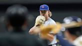 Cubs score five in 10th to beat Brewers