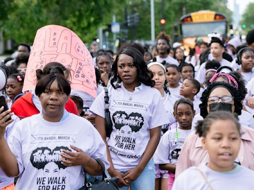 Hundreds march to demand more help finding Black girls and women who are missing — but never forgotten