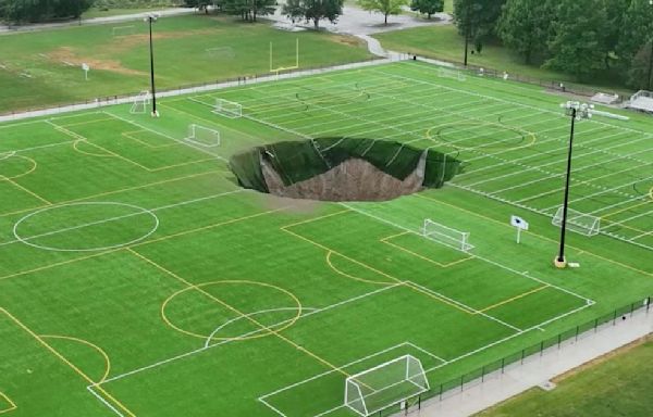 Massive sinkhole swallows Illinois soccer field after mine collapses