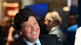 Tucker Carlson says he thinks he was fired from Fox for his stance on Ukraine — not racism, misogyny claims