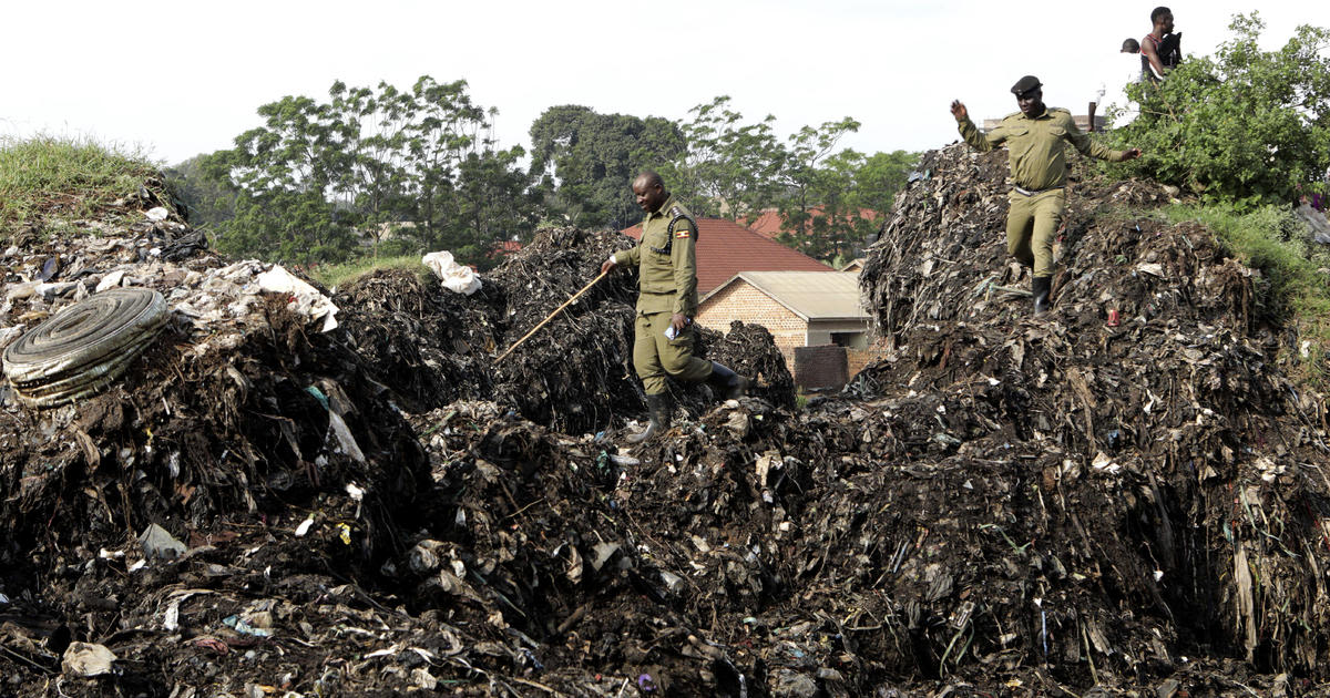 At least 18 dead and more still missing after landfill site collapses in Uganda