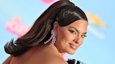 Ashley Graham praises Barbie's evolution as she grew up wondering: 'Why aren't my thighs touching? Why are her breasts so perky?'