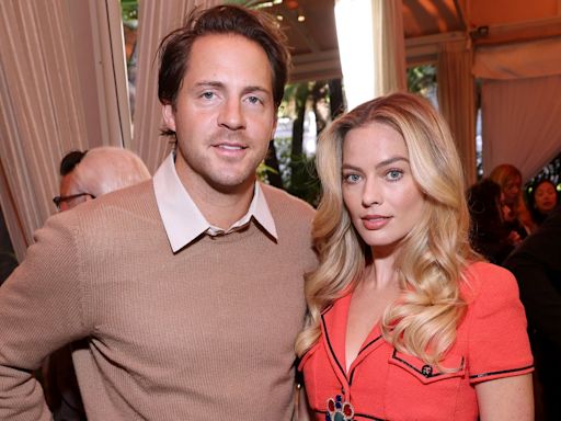 Margot Robbie and husband Tom Ackerley dual it out over if British or Aussie snack is better