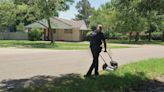 Officer stops to help mow lawn just because