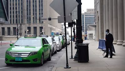 Uber welcomes taxi drivers to its Chicago app