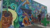 Denver mural, once nearly destroyed, is now nearly restored