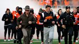 What is Oklahoma State football coach Mike Gundy's Big 12 Championship Game bonus?