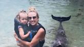 Brittany Mahomes and Daughter, 2, Enjoy Dolphin Meet-and-Greet During Island Family Vacation