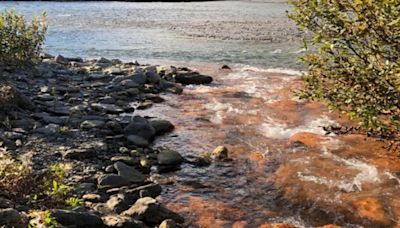 Why are rivers in Alaska turning orange?