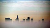 Local air regulators say it's impossible to meet smog standards without federal help