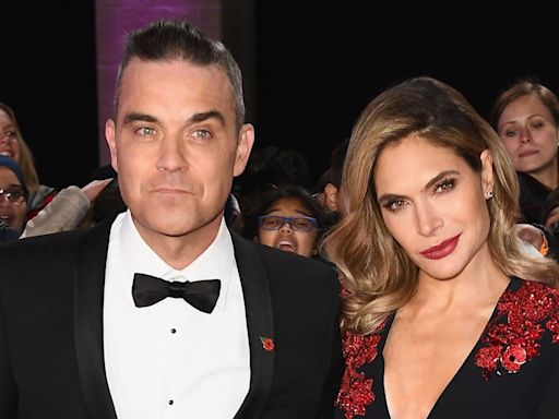 Robbie Williams reveals secret vow renewal to beautiful wife Ayda Field in unexpected post