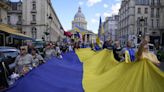 Peaceful pre-Olympic protest in Paris honors fallen Ukrainian athletes