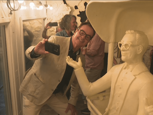 Iowan Steve Higgins sees his butter sculpture at the Iowa State Fair