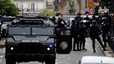 Paris on lockdown after man threatens to detonate 'explosive belt'