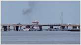 Barge causes oil spill when it hits bridge in Galveston, Texas