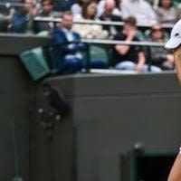 Pain game: Madison Keys cries as she retires from her match against Jasmine Paolini