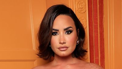 Demi Lovato Reflects on Emotional and Physical Impact of "Traumatic" Child Stardom - E! Online