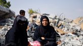 Palestinian sisters cry out for missing mother after Gaza airstrike