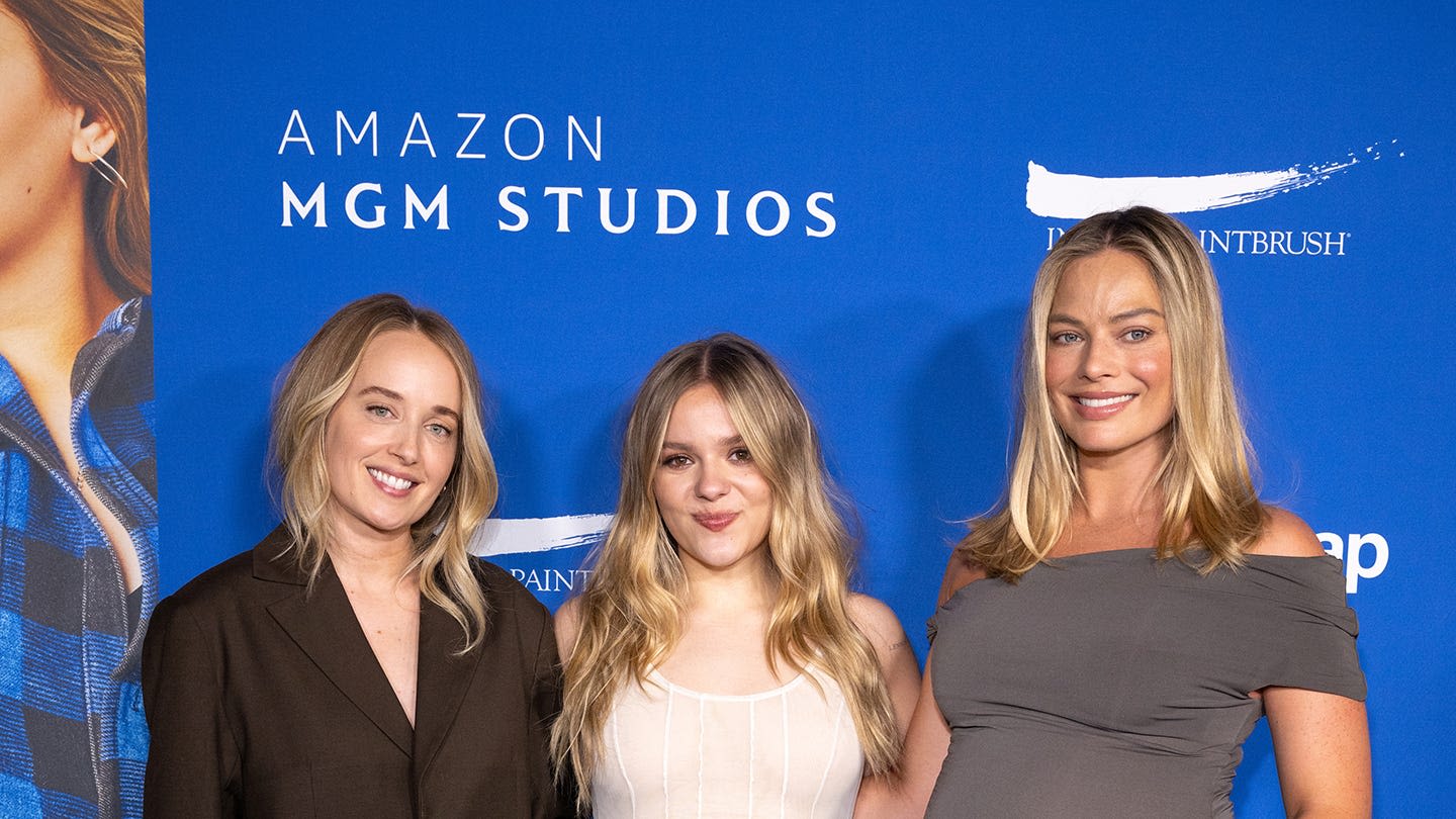 Margot Robbie Debuts Her Baby Bump in a Stretchy Gray Bodycon Dress