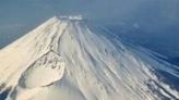Tourists are flocking to take photos of Japan's highest peak Mount Fuji