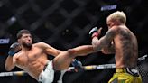 Pereira retains light heavyweight title with 1st-round KO of Hill at UFC 300