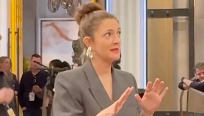 Drew Barrymore keeps her face glowing with a $13 oil - fans say it's a 'miracle'