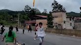 Suspected Chinese rocket debris seen falling over village after launch, video shows