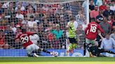 Arsenal beats Man United 1-0 to take title race with Man City to final day of Premier League season