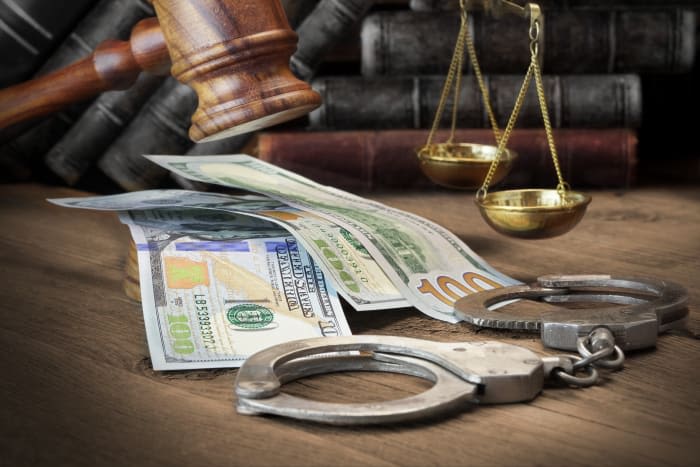 Flint woman accused of embezzling over $400K from vulnerable adult to face trial