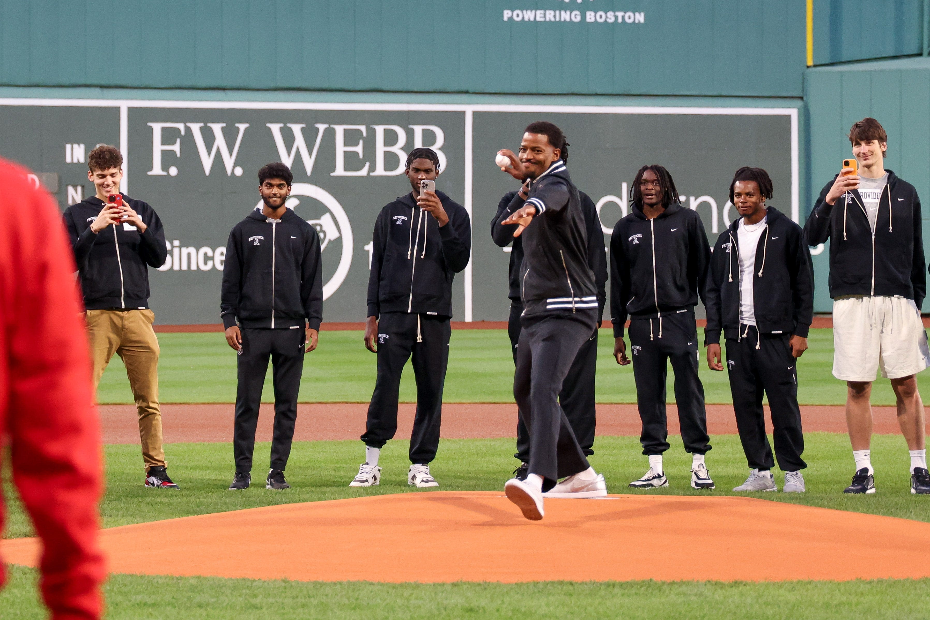 Providence basketball coaches take mound at Fenway ahead of Red Sox-Orioles