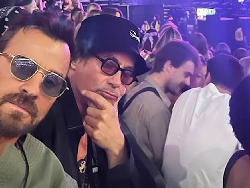 Justin Theroux and Robert Downey Jr. attend Olivia Rodrigo concert