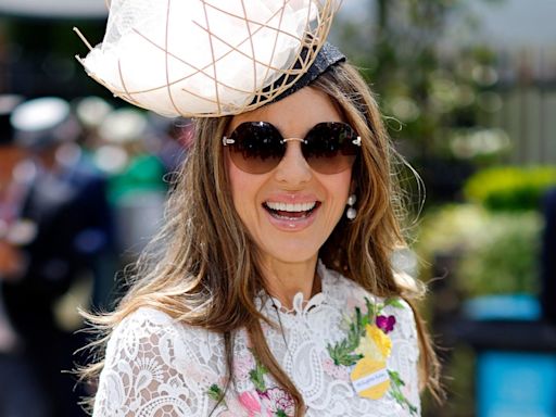 Elizabeth Hurley steps out in figure-hugging lace dress and daring fascinator for exciting day out