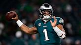 Jalen Hurts runs for 2 TDs, throws for a score; Eagles hold off fumble-prone Vikings 34-28