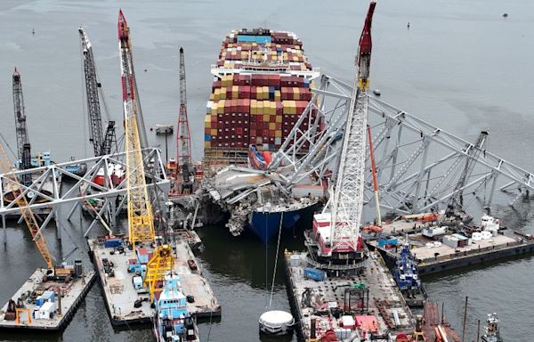 Weather causes crews to delay using explosives to demolish part of Baltimore’s Key Bridge to help free a trapped cargo ship